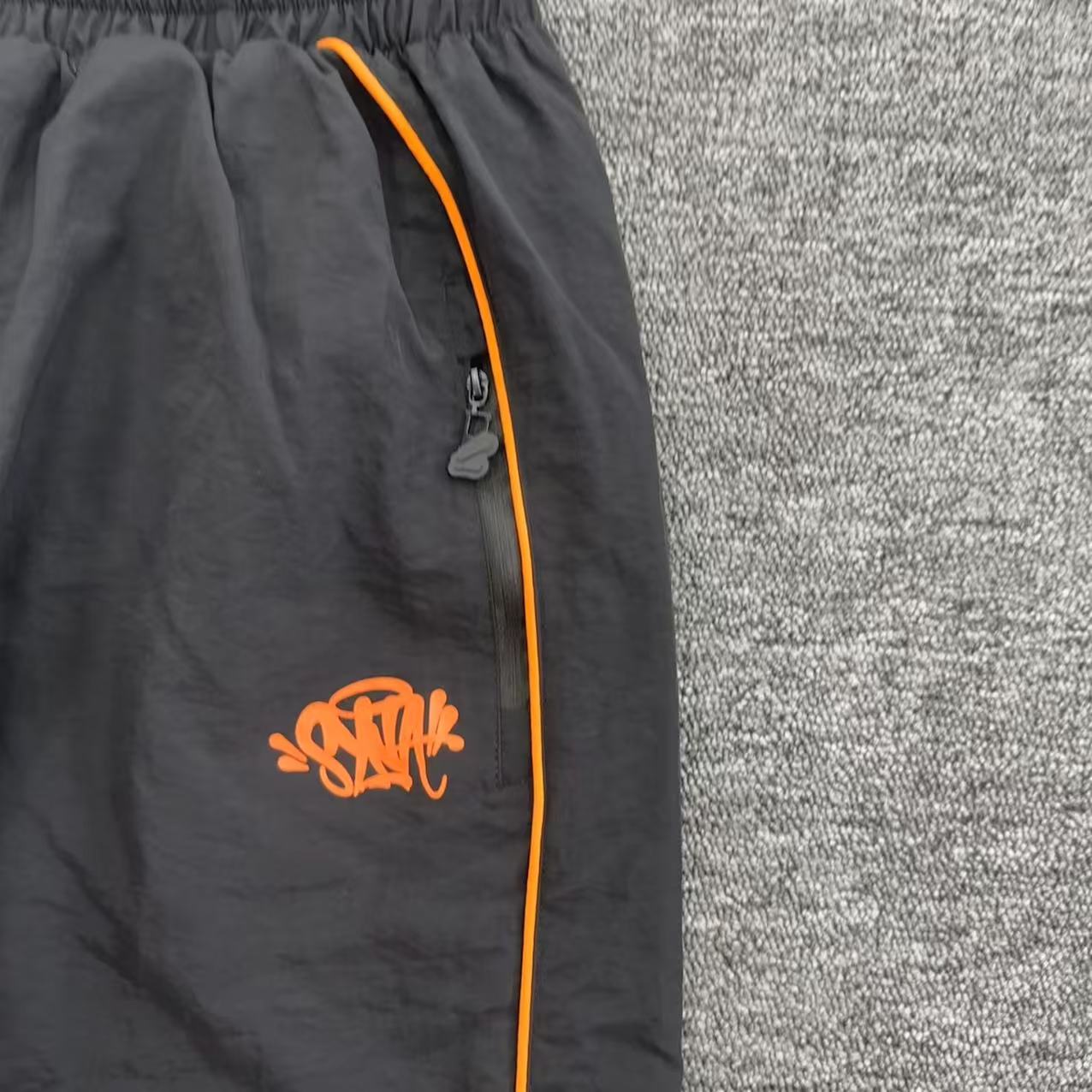 Syna World x CRG Shell Tracksuit